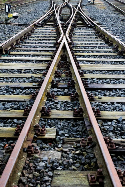 Railroad crossing on a gravel — Stock Photo, Image