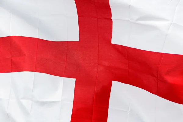 Englands Flagge im Wind im Sonnenlicht — Stockfoto