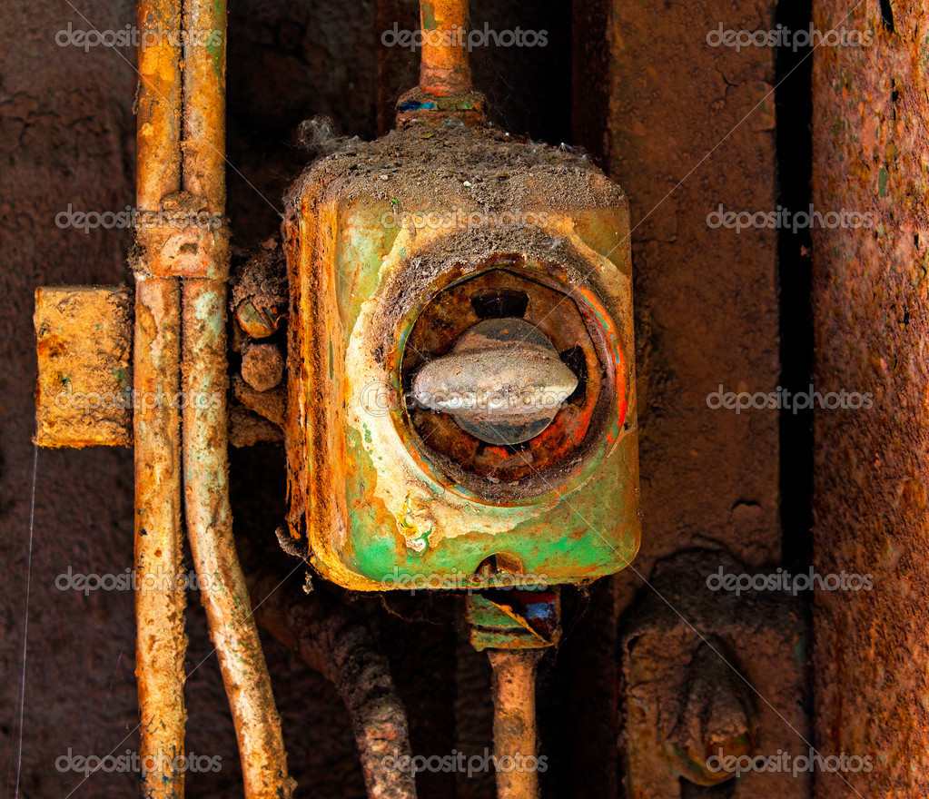 Old electric switch on a rusty iron wall Stock Photo by ©wlad74 49924417