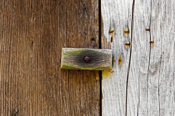 Wooden latch on a wooden door — Stock Photo, Image