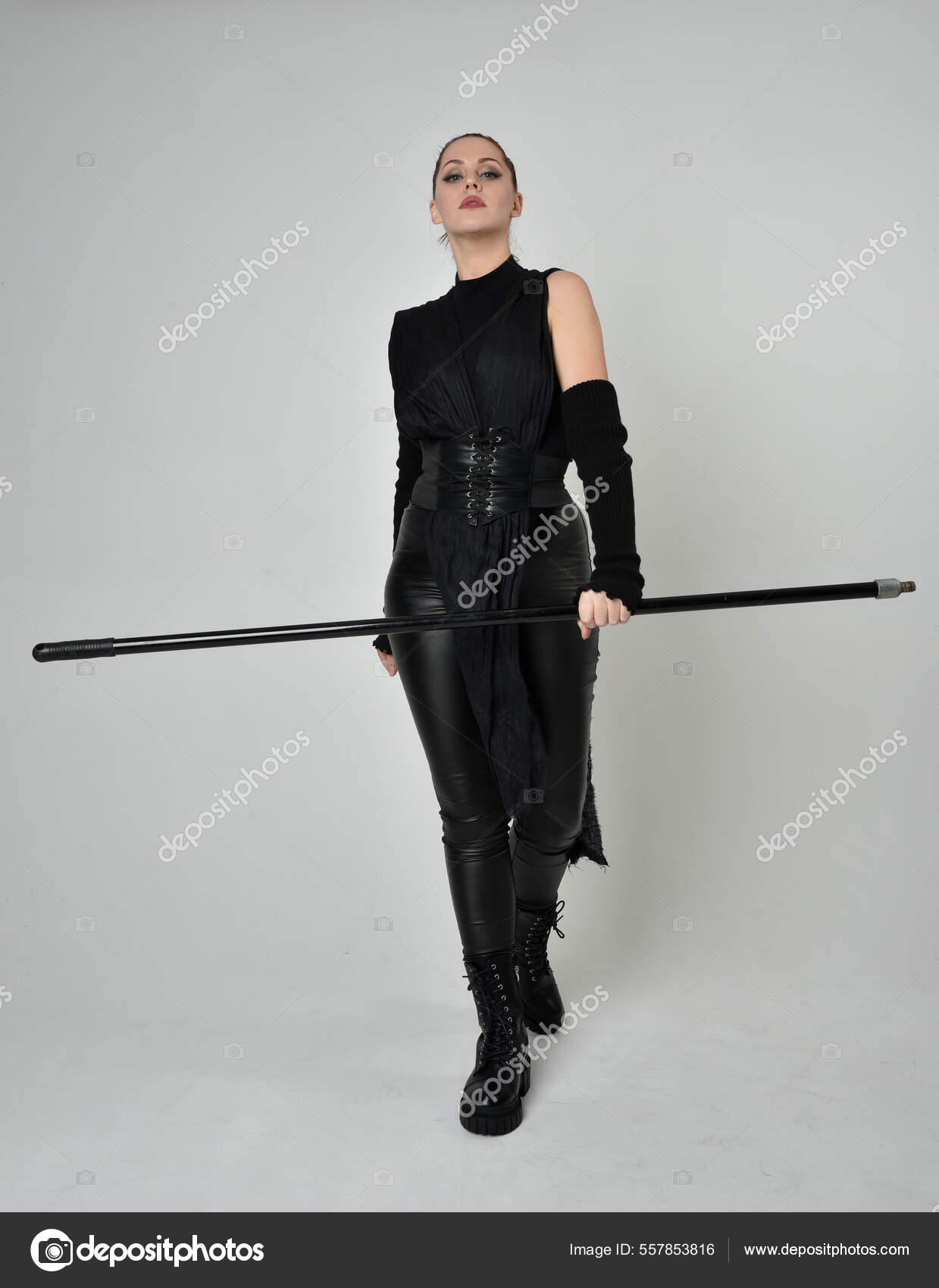 Muscular warrior holding spear. Stock Photo by ©serhii.bobyk.gmail.com  394366398