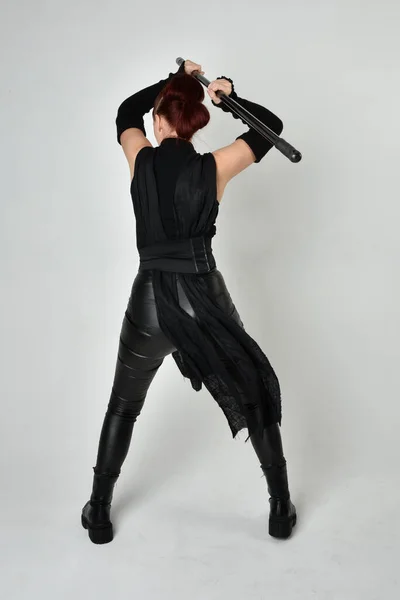 Full Length Portrait Pretty Redhead Female Model Wearing Black Futuristic Stock Picture