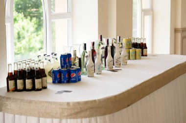 Dolyna, Ukraine June 28, 2021: Ukrainian wedding and tables with drinks to choose from, snacks and alcoholic beverages, wedding celebrations.