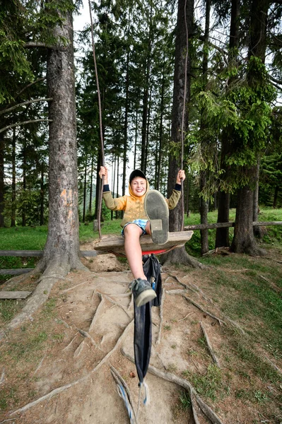 Boy Swings Swing Somewhere Forest Walk Carpathians Summer — Stock Fotó