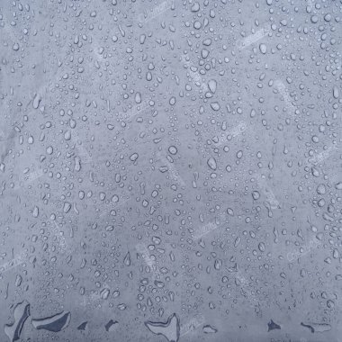 Vorokhta, Ukraine June 12, 2022: raindrops on a tent from Coleman, a double-layer waterproof tent.