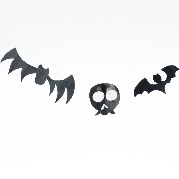 Skulls Flying Bats Cut Out Black Paper White Background Preparation — Stok fotoğraf