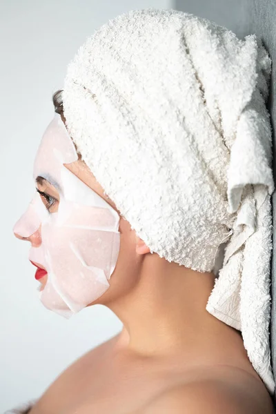 Facial Skin Care Portrait Young Woman Mask Her Face Fabric — Stockfoto