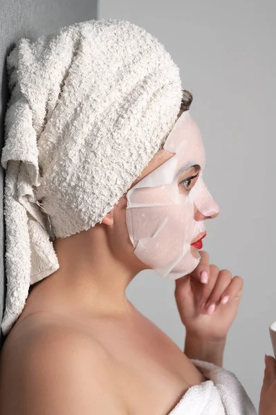 Facial Skin Care Portrait Young Woman Mask Her Face Fabric — Stok fotoğraf