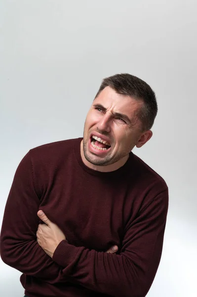 Man Touches His Stomach Two Hands White Background Copy Space — Fotografia de Stock