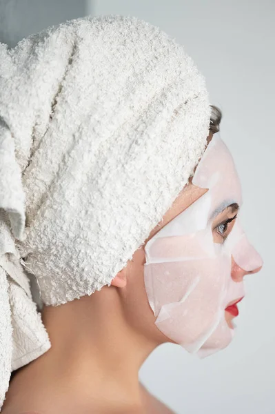Facial Skin Care Portrait Young Woman Mask Her Face Fabric — Stockfoto