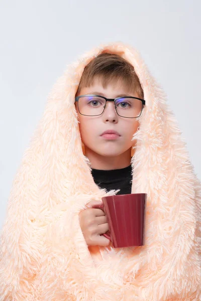 Boy Flu Wrapped Blanket Drinks Hot Tea Child Wears Glasses — Stok fotoğraf