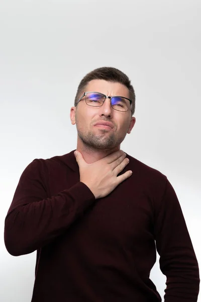 Handsome Man Glasses Isolated Background Touching Painful Neck Sore Throat — ストック写真