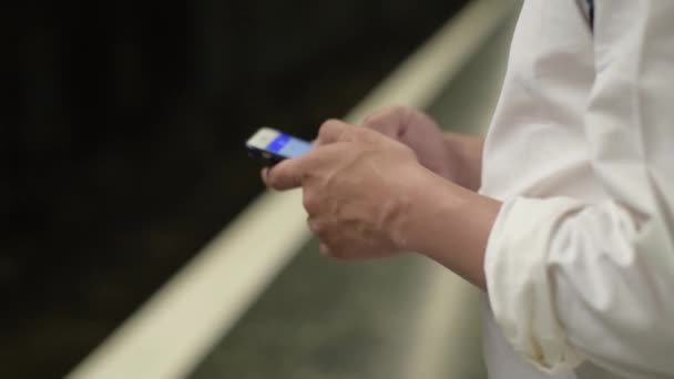 Man Subway Phone His Hands Texting Metro Station — Vídeo de Stock