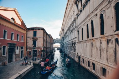 Italy. Venice. 09.07.2022 Venice Grand Canal. People float on gondolas, gondoliers. View of the city, travel, tourists
