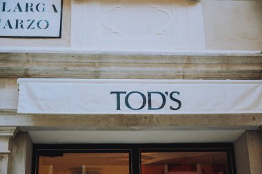 Italy. Venice. 09.07.2022 Fashion country, boutique clothing store, sale, signboard Tods