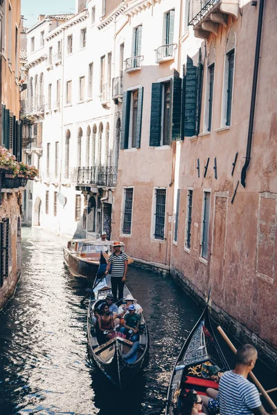 Italy. Venice. 09.07.2022 Venice Grand Canal. People float on gondolas, gondoliers. View of the city, travel, tourists