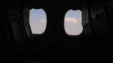 View from inside the plane on the runway noise night.