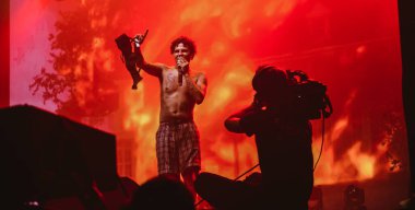 Hungary, Budapest, 12.08.2022 sziget festival Slowthai the singer performs on stage. Male star with a bra in his hands