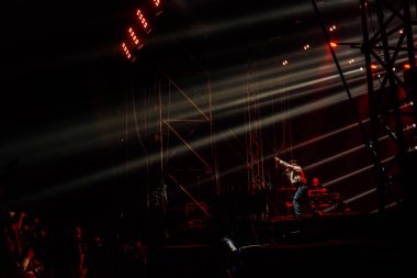Hungary, Budapest, 12.08.2022 sziget festival  Woodkid with the team on stage in the rays of light
