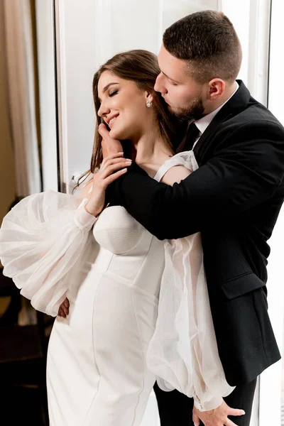 beautiful bride and groom in the room