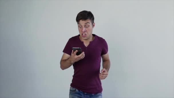 Excited Guy Student Winner Hold Smartphone Feel Amazed Overjoyed Mobile — 비디오