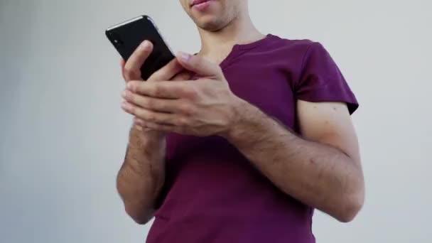 Excited Guy Student Winner Hold Smartphone Feel Amazed Overjoyed Mobile — Vídeo de stock