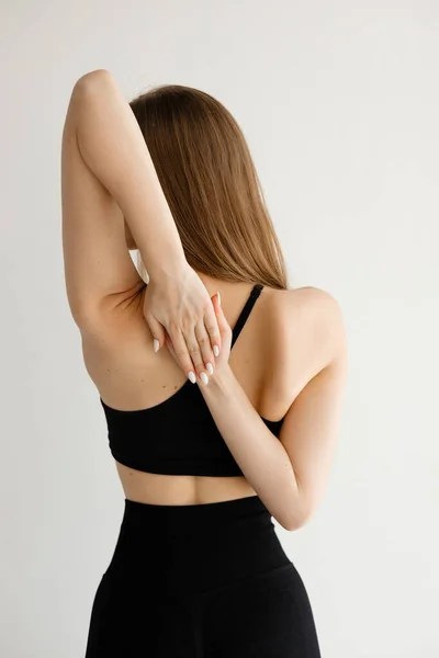 Sports Girl Holding Her Hands Her Back High Quality Photo — Stockfoto