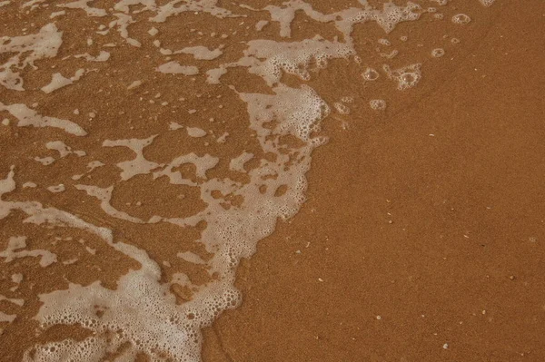 Superficie Del Mare Sulla Sabbia Onde Sulla Spiaggia Come Sfondo — Foto Stock