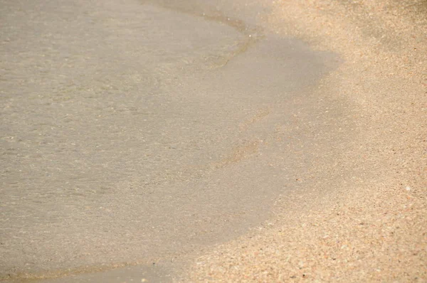 Superficie Del Mare Sulla Sabbia Onde Sulla Spiaggia Come Sfondo — Foto Stock
