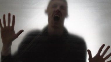 Blurred silhouette of a man. Horror or crazy concept. Mental health.