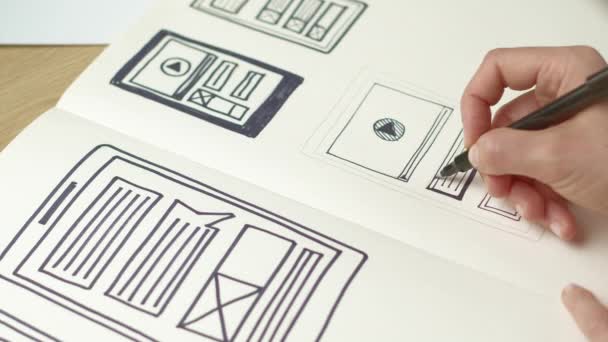 Designer Sketches User Interface Web Application Mobile Phone Developer Creates — Stock Video