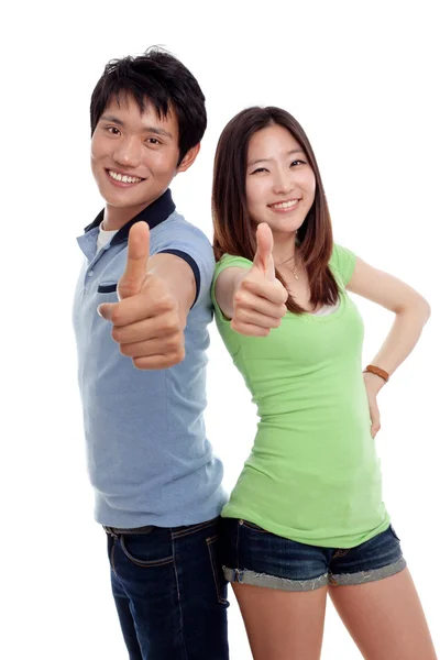 Young smiling with thumbs up gesture — Stock Photo, Image