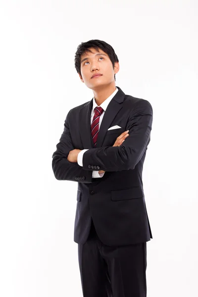 Olhando para cima homem de negócios asiático — Fotografia de Stock