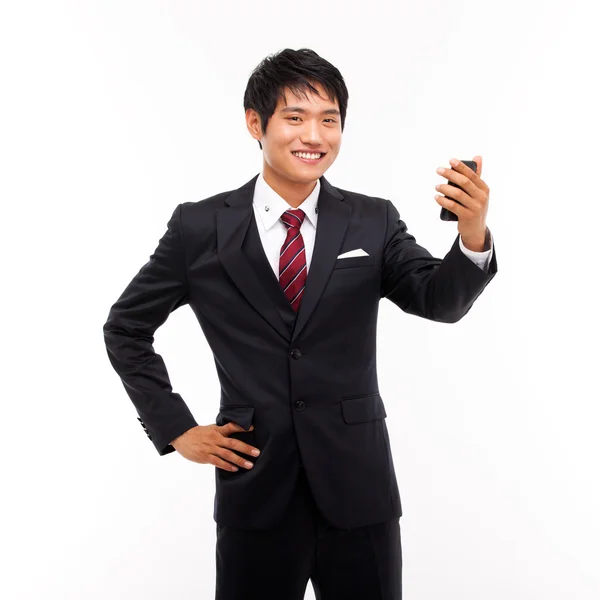 Asiatico uomo d'affari con cellulare — Foto Stock