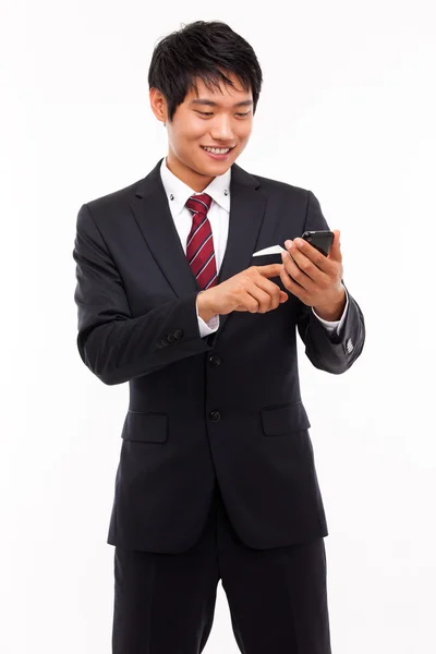 Азиатский бизнесмен с мобильным телефоном — стоковое фото
