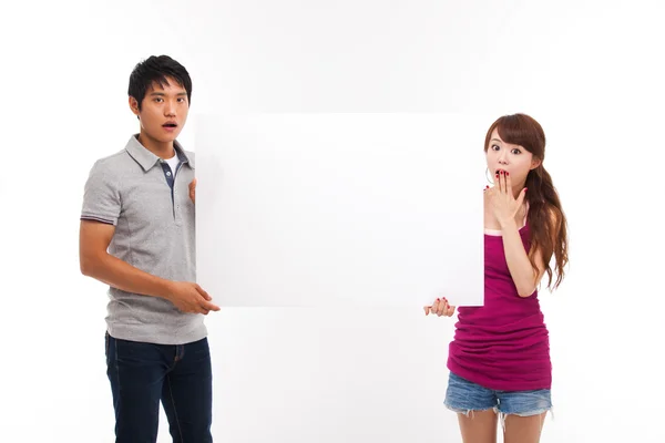 Young couple take white panel — Stock Photo, Image