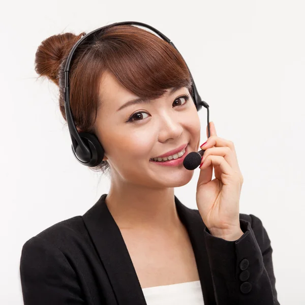 Glimlachende zakenvrouw van call center exploitant Rechtenvrije Stockfoto's