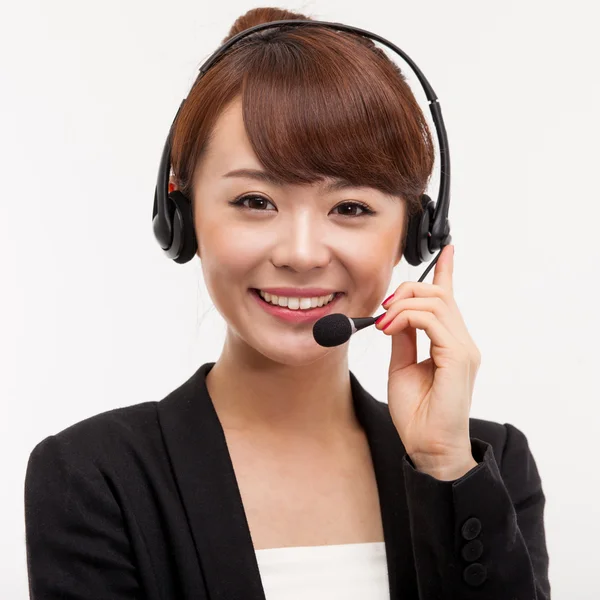 Χαμογελώντας κλήση κέντρο χειριστή γυναίκα των επιχειρήσεων Φωτογραφία Αρχείου