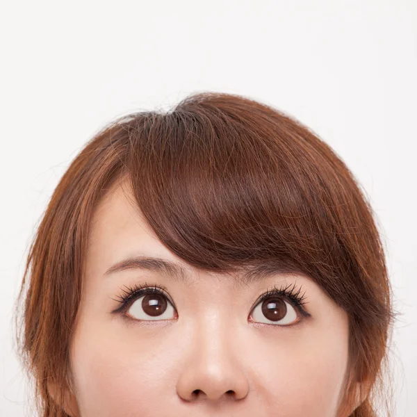 Looking up space Asian woman — Stock Photo, Image