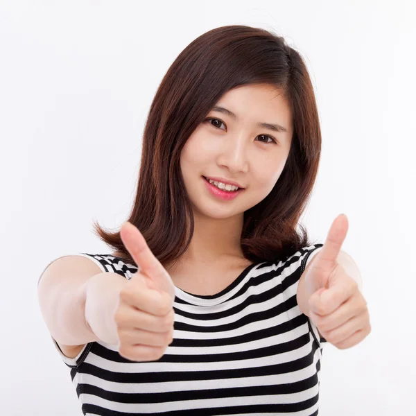 Młoda kobieta Azji wyświetlone kciuka — Zdjęcie stockowe