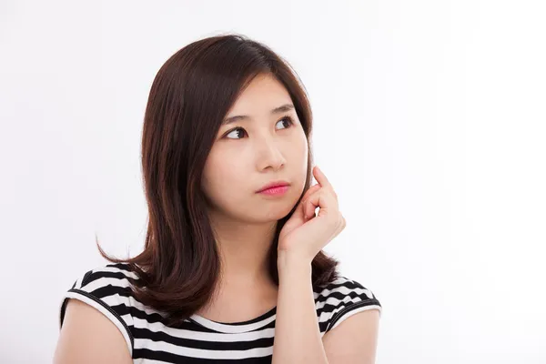 Denkende junge asiatische Frau — Stockfoto