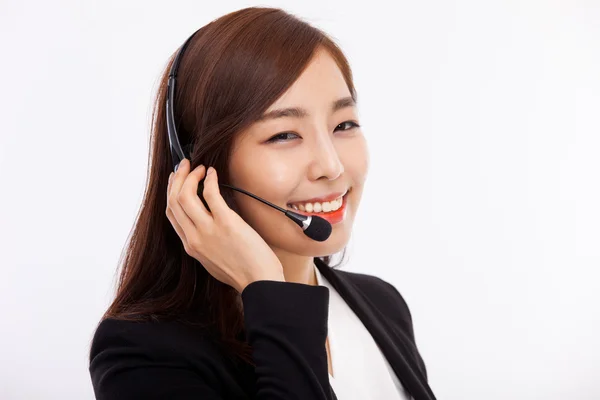 Sonriente operador de centro de llamadas mujer de negocios — Foto de Stock