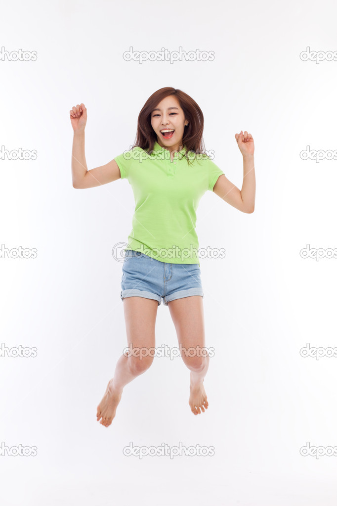 Jumping happy asian woman