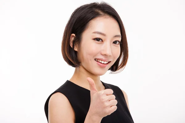 Успешная азиатская бизнесвумен показывает большой палец . — стоковое фото