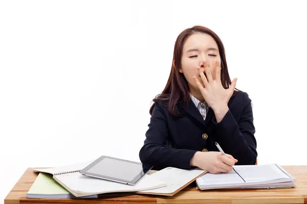 Genç Asyalı öğrenci esneme.