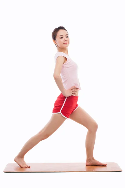 Joven mujer asiática ejercicio yoga — Foto de Stock