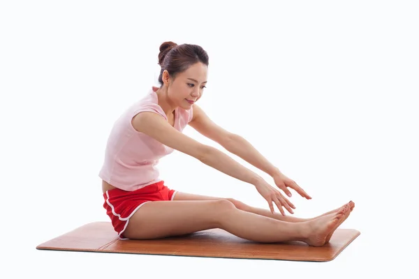 Joven mujer asiática ejercicio yoga — Foto de Stock