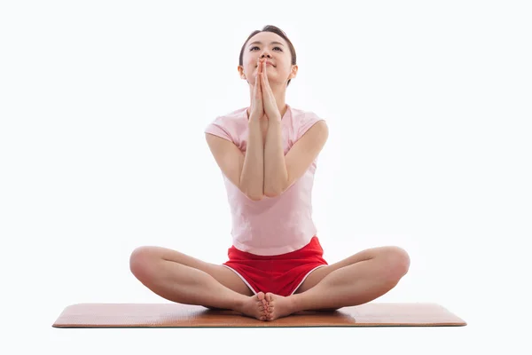 Young Asian woman exercise yoga Stock Image