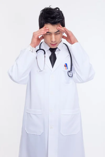 Young Asian doctor having a stress — Stock Photo, Image