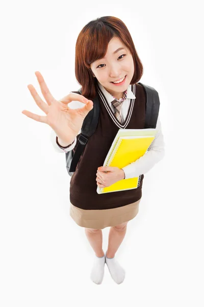 Junge asiatische Studentin isoliert auf weißem Hintergrund. — Stockfoto